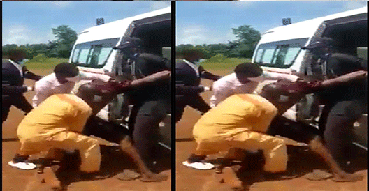 Health officials violate safety measures as they force suspected Coronavirus patient into an ambulance in Ebonyi