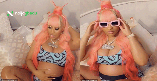 Pregnant Nicki Minaj flaunts her growing baby bump in Burberry